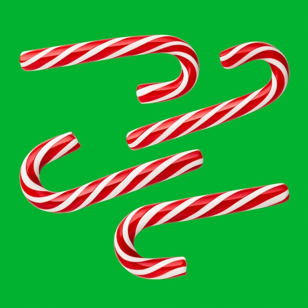 Christmas candies - handmade peppermint candy canes. Set of festive sweets on a green (chromakey) background