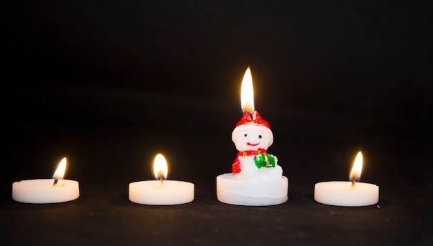 Christmas candles snowmen