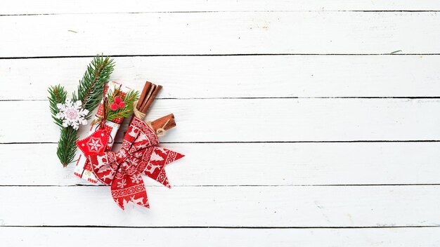 Christmas card. Gift boxes, Christmas tree and Christmas decorations on a white background. Top view.