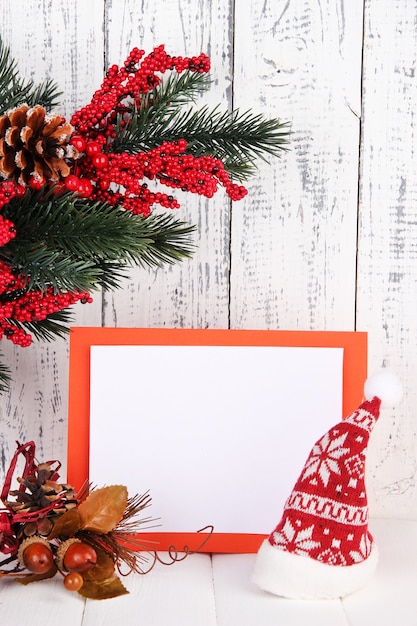 Christmas card on wooden background