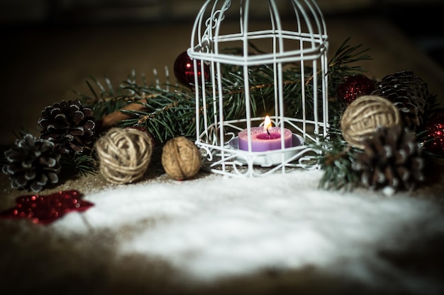 Christmas cardvintage Christmas candle on festive background