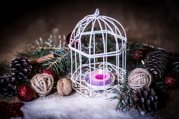 Christmas cardvintage christmas candle on festive background