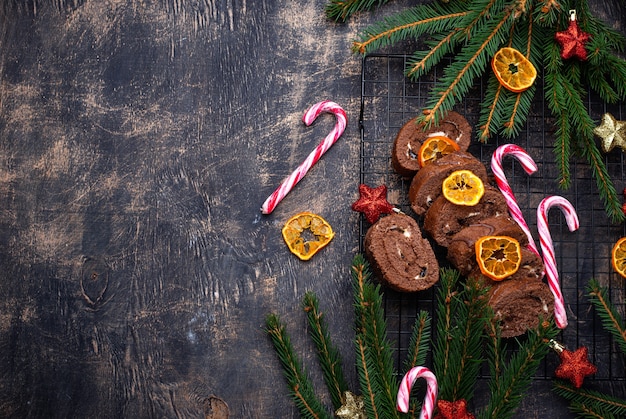 Christmas chocolate roll cake with cream