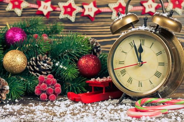 Christmas clock and fir branches