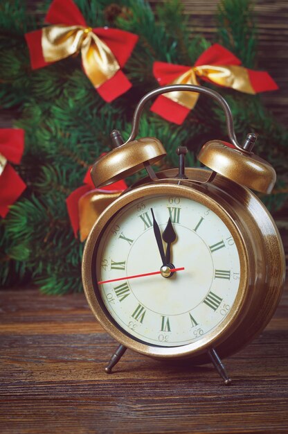 Christmas clock and fir branches