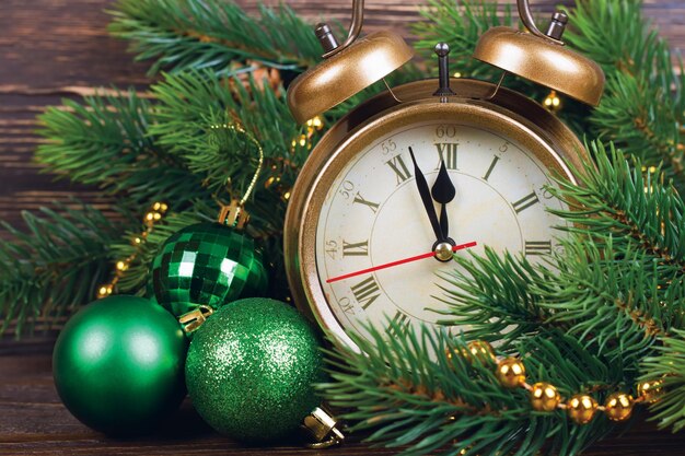 Christmas clock and fir branches