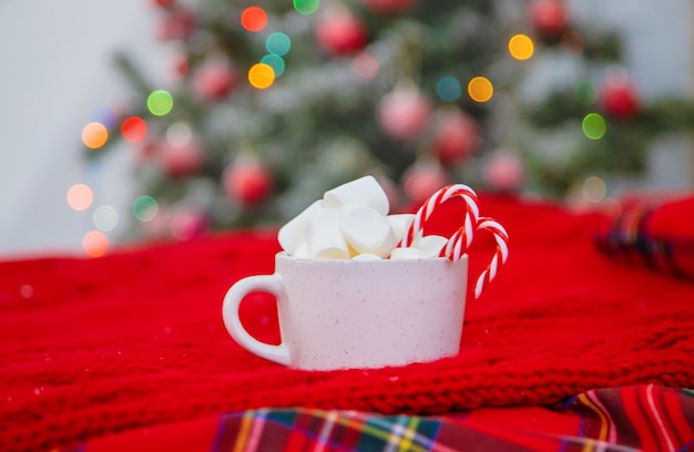 Christmas cocoa with marshmallows and candies. Selective focus. Holiday.