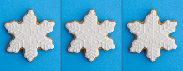 Photo christmas collage. snowflake-shaped gingerbread on the blue background. close-up.