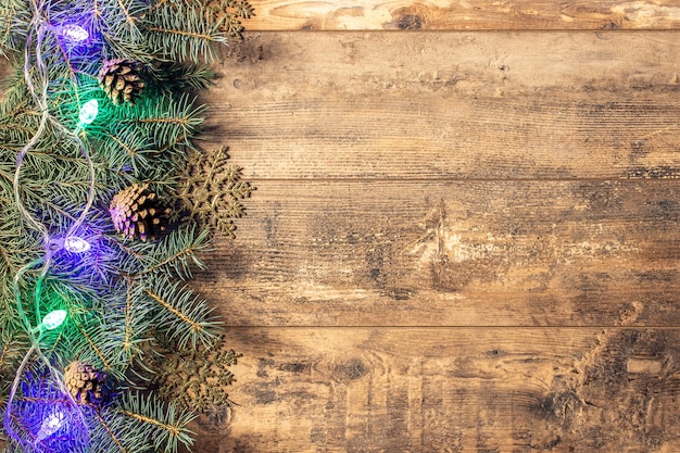 Christmas composition. Christmas grunge with fir branches and pine cones.