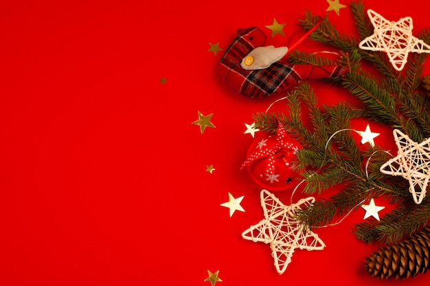 Christmas composition. Christmas pine branches, toys on white background. Flat lay, top view.