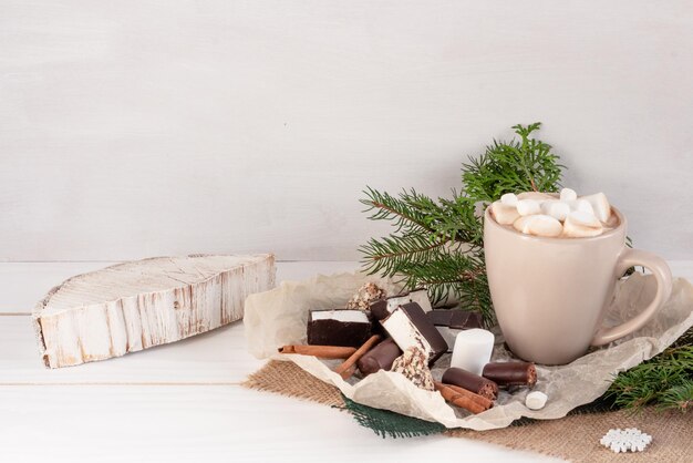 Christmas composition cocoa with marshmallows on a white background copy space