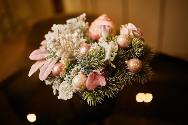 Christmas composition of fir branches and Christmas toys Christmas decoration close up