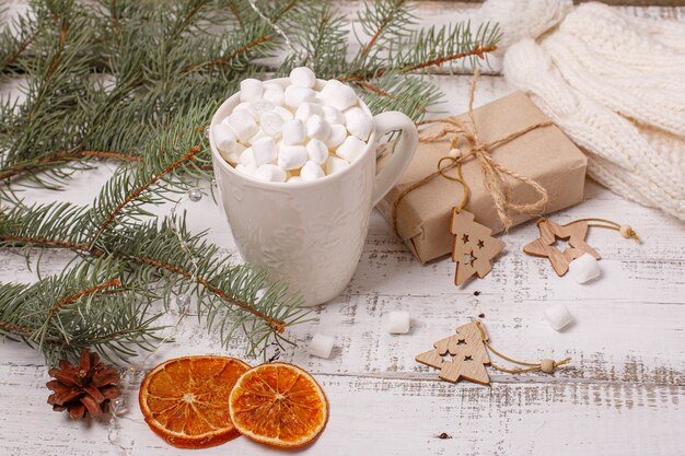 Christmas composition mug with cocoa and marmalade