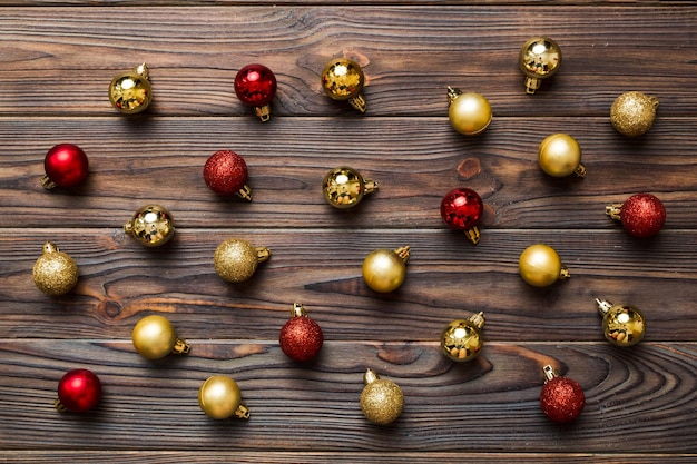 Christmas composition a pattern of christmas balls on colored background Flat lay top view New year decor