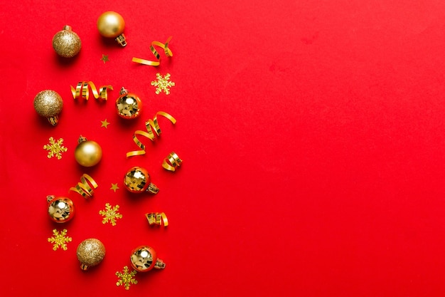 Christmas composition a pattern of christmas balls on colored background flat lay top view new year decor