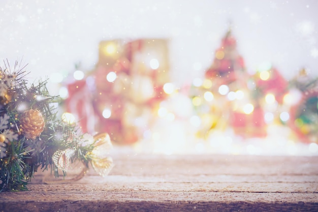 Christmas composition. rustic wood table in front of christmas light night,abstract circular bokeh background