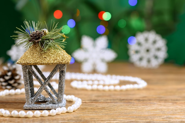 Christmas composition on rustic wooden table with copy space and bokeh