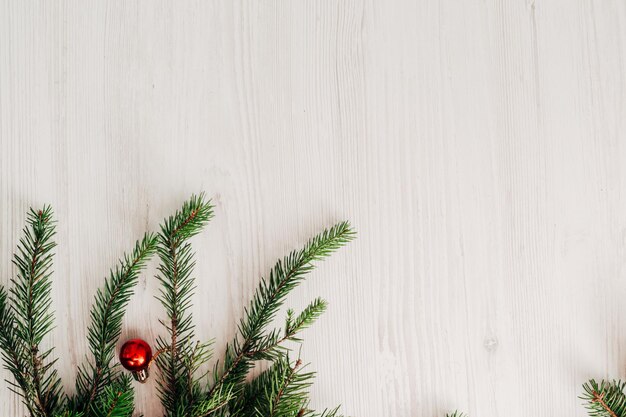 Christmas composition on a white wooden table with copy space