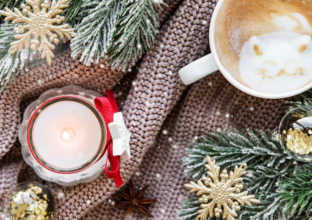 Christmas composition with cup of coffee and decorations