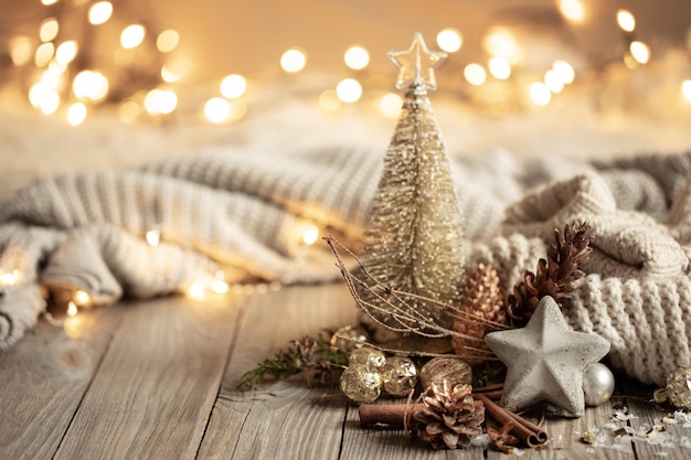 Christmas composition with decor details on blurred background with bokeh