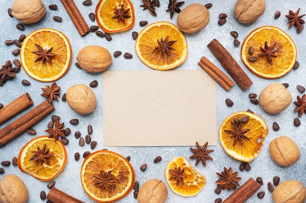 Christmas composition with dried oranges, cinnamon, anise, and nuts