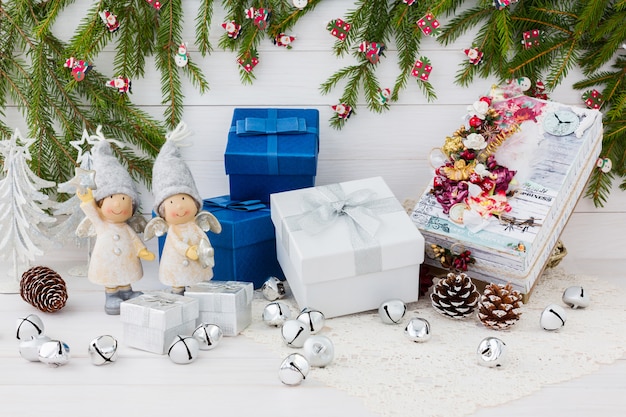 Christmas composition with gift boxes and angels