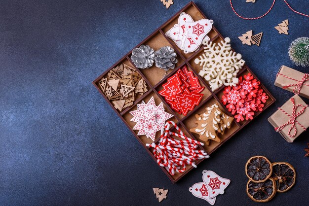 Christmas composition with gingerbread cookies Christmas toys pine cones and spices