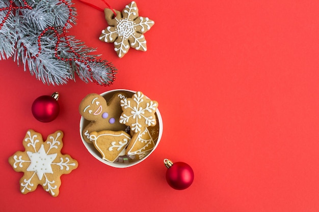 Christmas composition with gingerbreads in a gift box