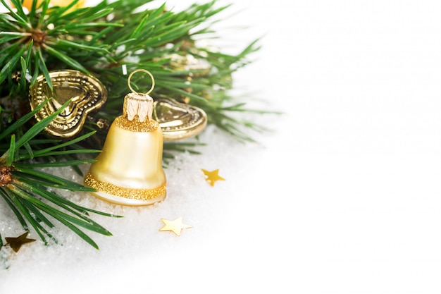 Christmas composition with golden bell