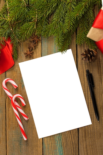 Christmas composition with a letter with a place for text and candy canes