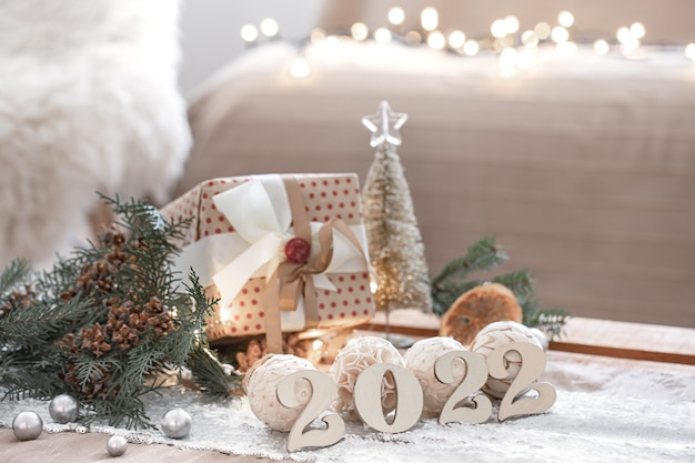 Christmas composition with numbers  on blurred background with bokeh