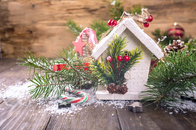 Christmas composition with white wooden house