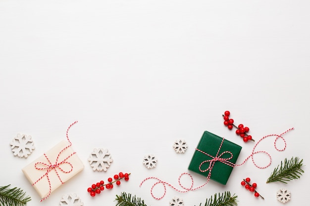 Christmas composition. Wooden decorations, stars on white background. 