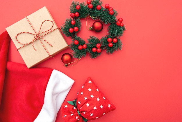 Christmas composition, wreath, Christmas toy and bag, winter holiday concept picture