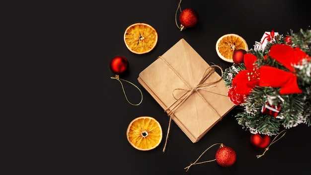 Christmas composition. xmas festive decoration with letters on black background