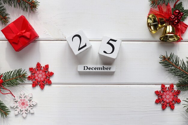 Christmas concept festive table with christmas decorations and calendar dated december