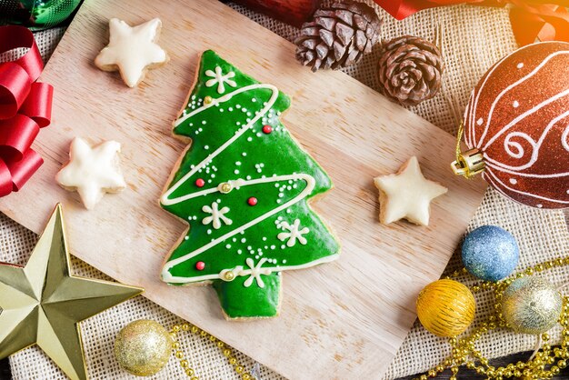 Christmas Cookie and New Year in the shape of Christmas tree on table