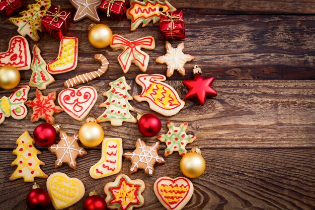 Christmas cookies on brown wooden table Top view and mock up