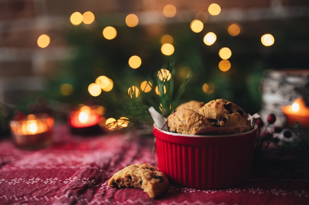 Christmas cookies and candles, christmas tree and lights.