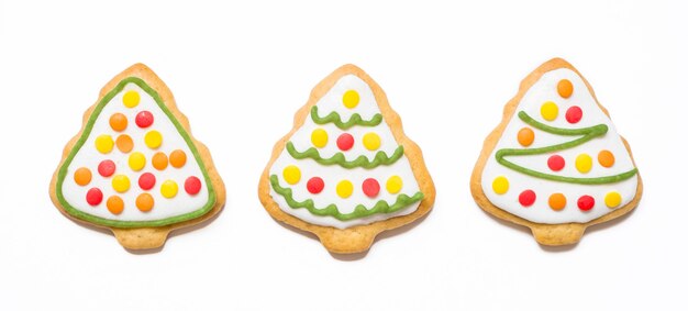 Christmas cookies in the form of trees on isolated white background