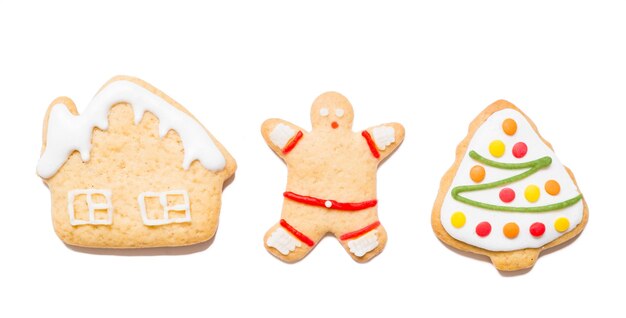 Christmas cookies of various shapes on isolated white background