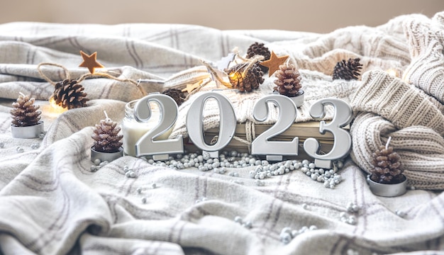 Christmas cozy background with numbers 2023 and decor details