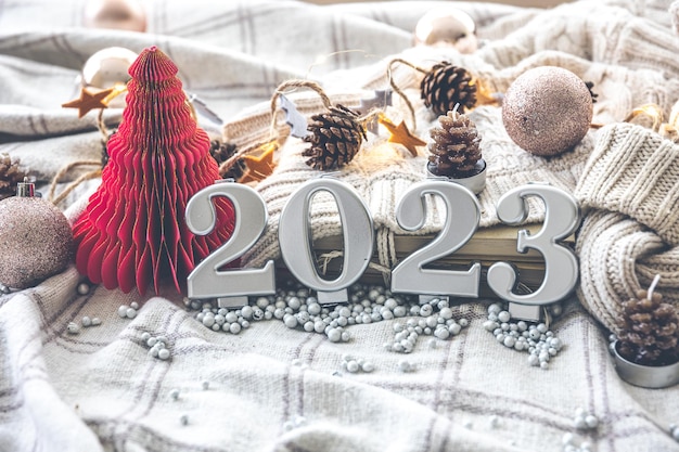 Christmas cozy background with numbers 2023 and decor details