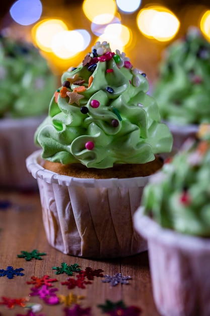 Christmas cupcakes in the form of a Christmas tree Christmas dessert closeup with selective focus