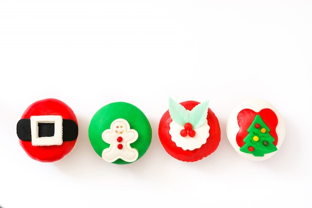 Christmas cupcakes isolated on white background