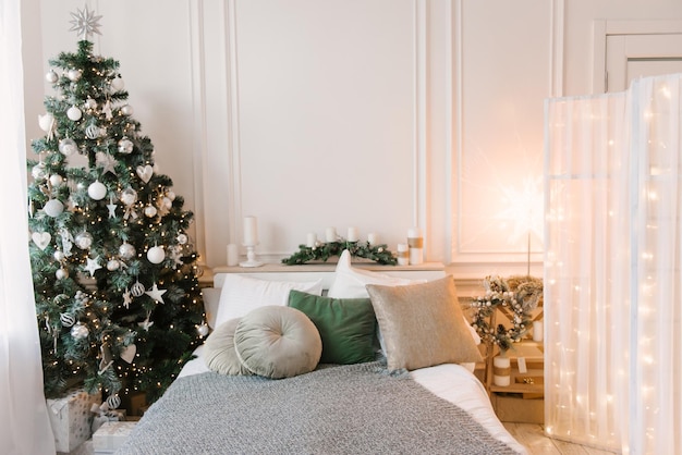 Christmas decor beautifully decorated living room with fireplace and firewood