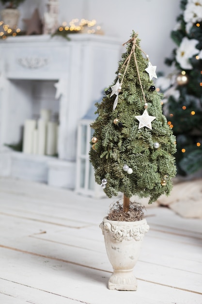 Christmas decor. Christmas tree with decoration. Winter holidays.