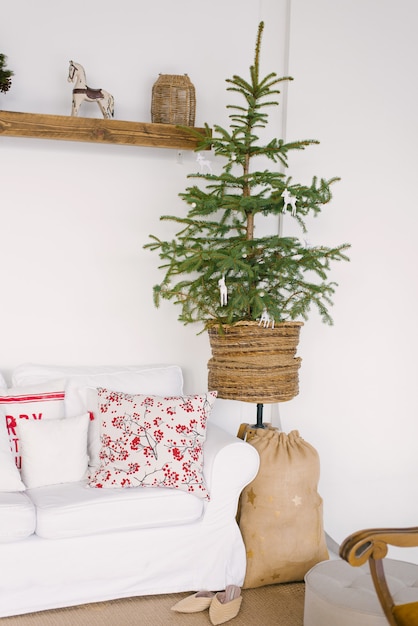 Christmas decor of the living room in the Scandinavian style