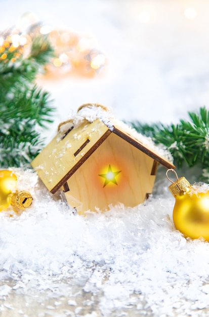 Christmas decor, new year snow house. Selective focus. Holiday.