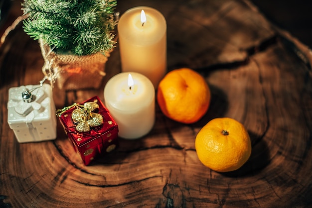 Christmas decor with candles and gifts